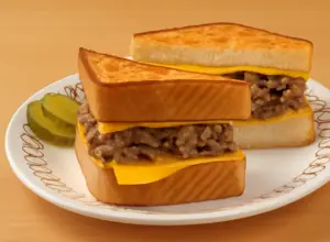cheesesteak melt sandwich with grilled cheese and melted cheese