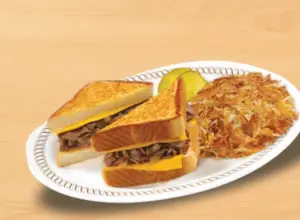 Fresh waffle house texas cheesesteak melt with hashbrowns a dinner item.
