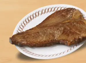 Enjoy a side item t-bone with your meal at the waffle house.